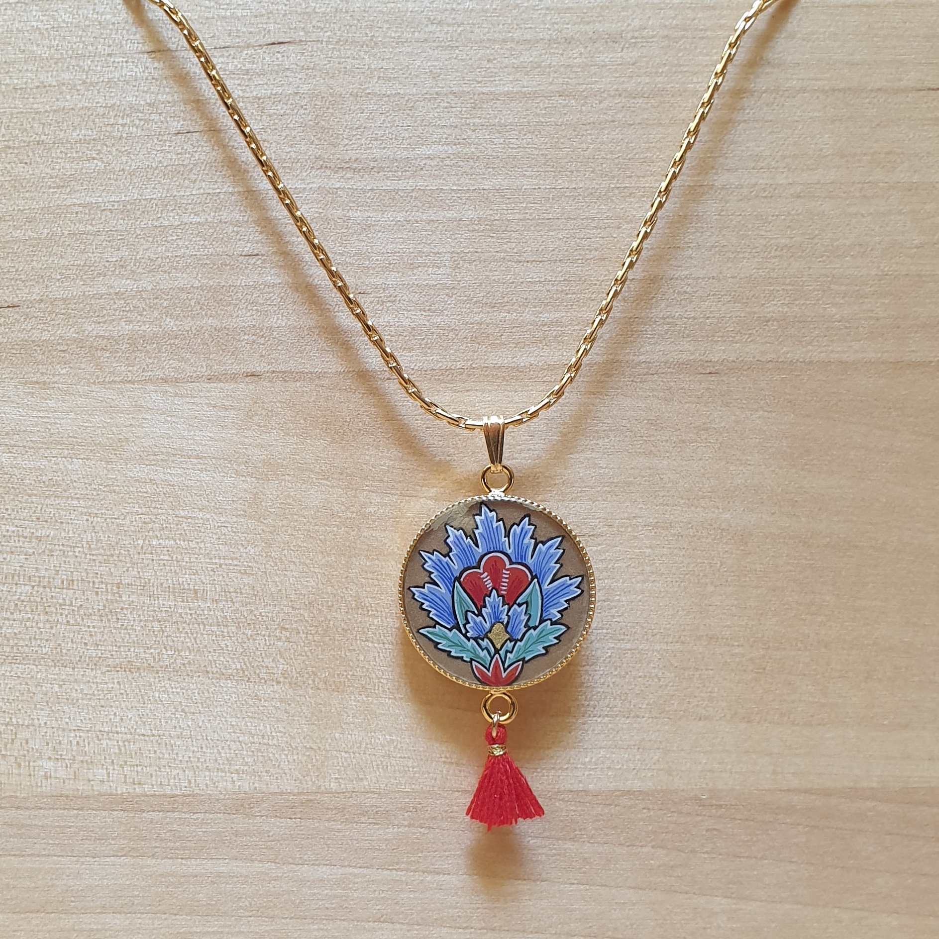 Collier pendentif fleur orientale bleue