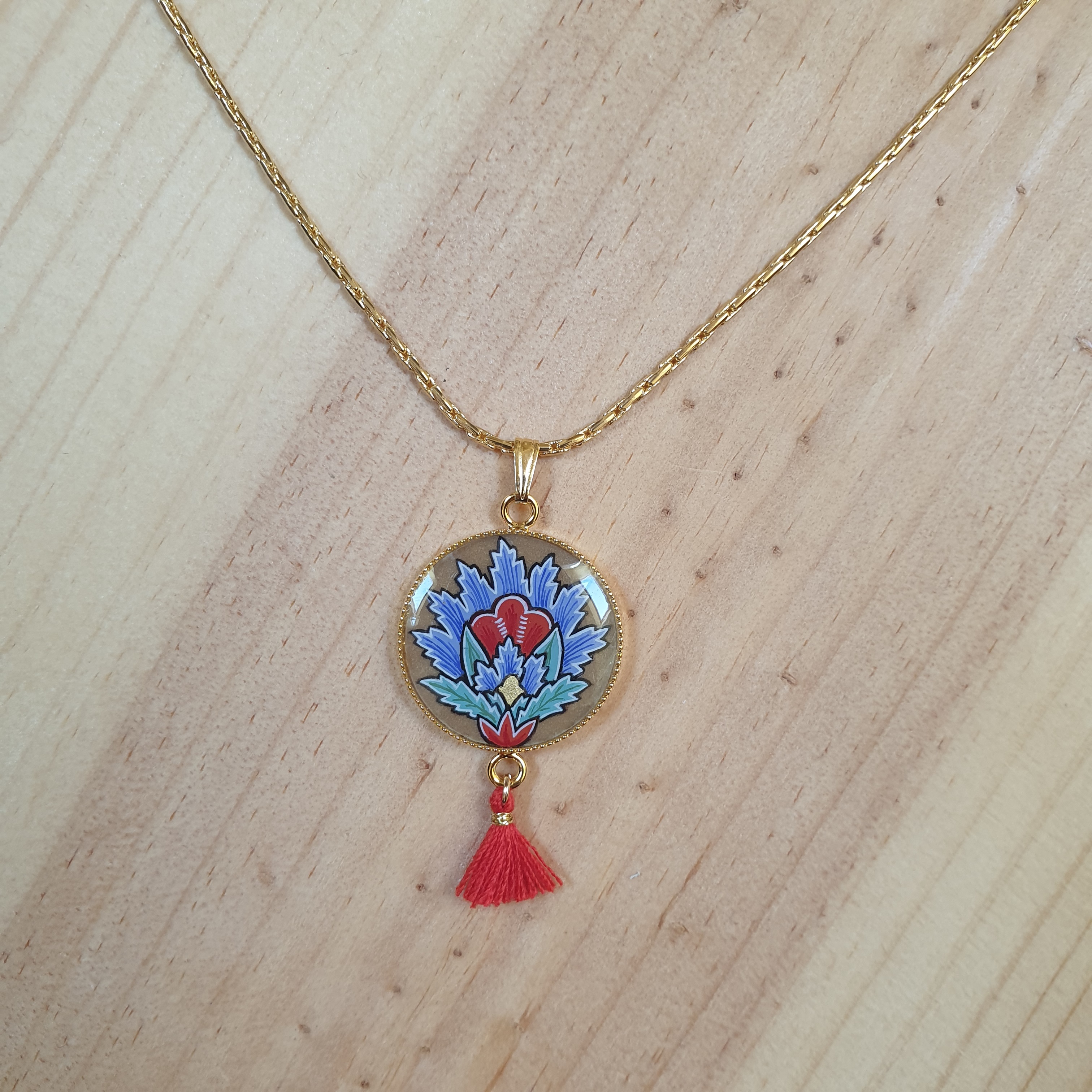 Collier pendentif fleur orientale bleue