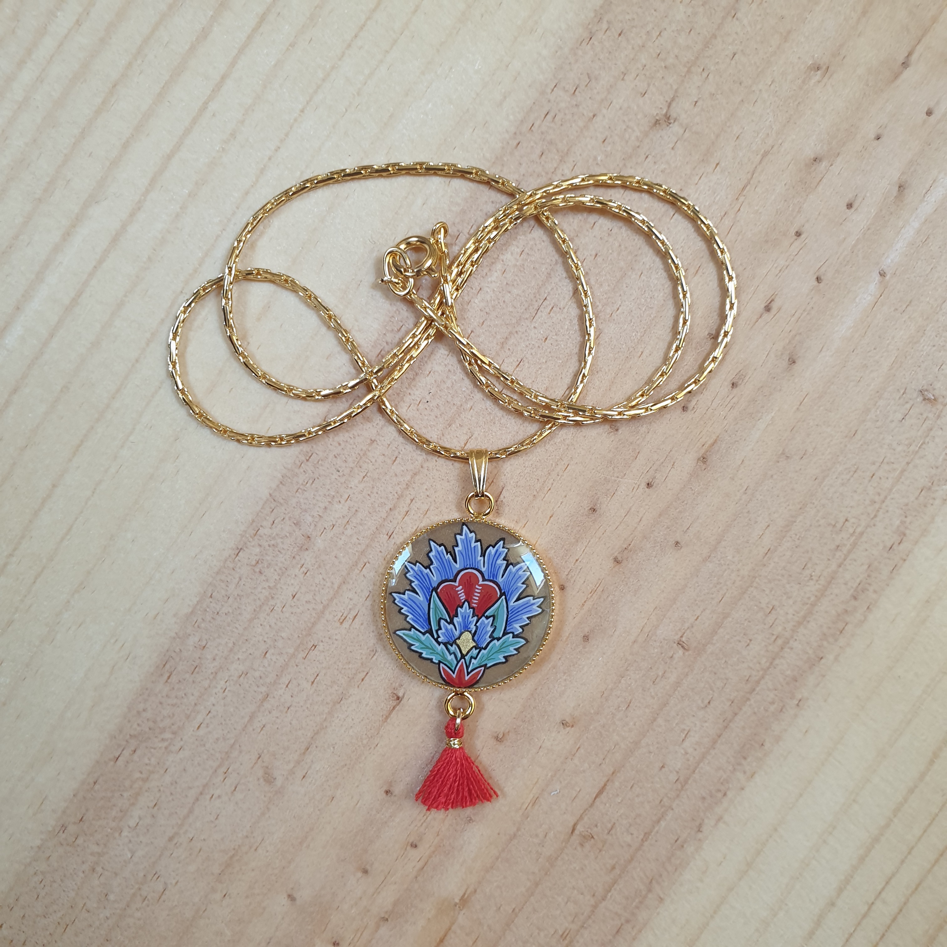 Collier pendentif fleur orientale bleue